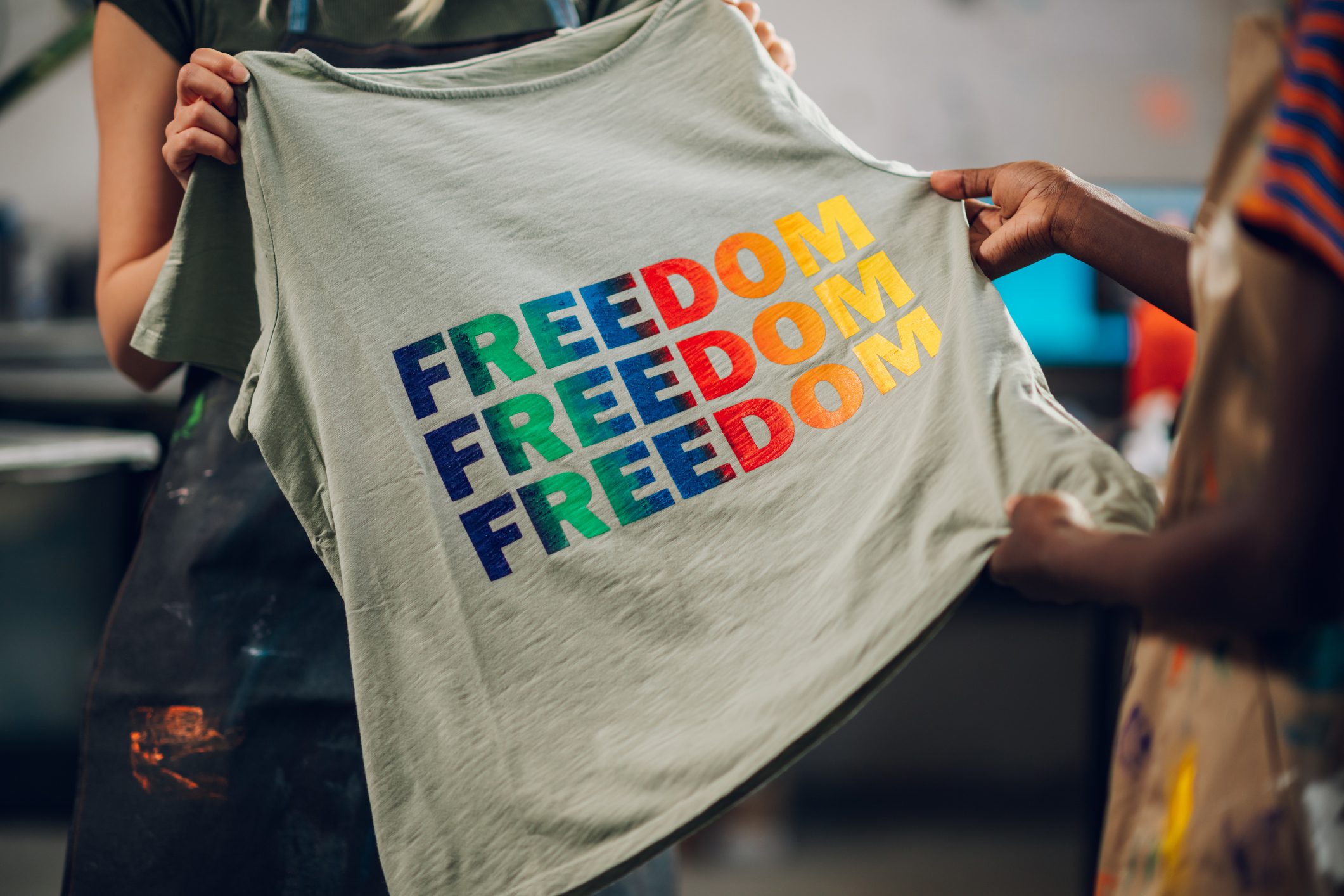 T-shirt with colorful "FREEDOM" print design.